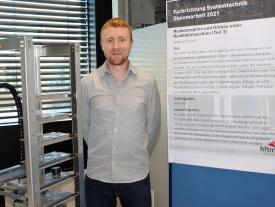 Andreas Schori aus dem Fachbereich Systemtechnik präsentiert seine Diplomarbeit an der Diplomausstellung an der hftm in Biel/Bienne